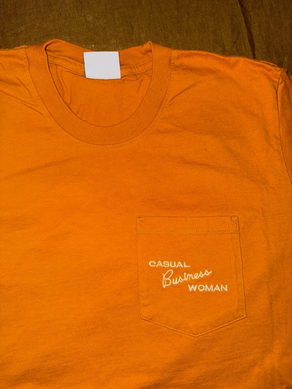 “CASUAL BUSINESS WOMAN” graphic pocket tshirt